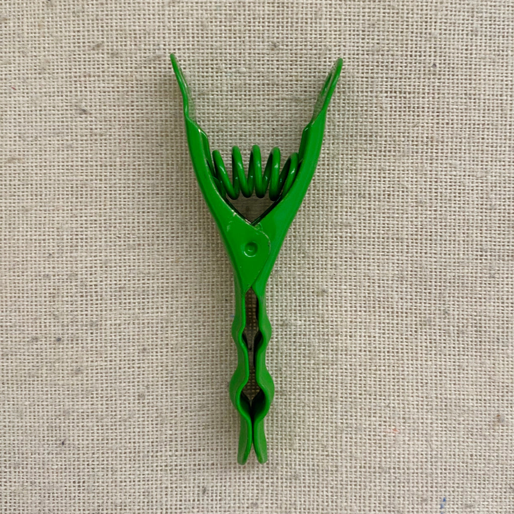 green stainless steel pegs