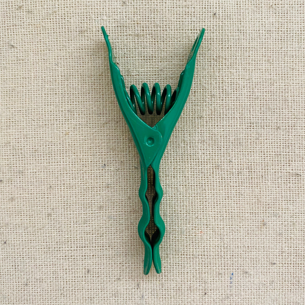 green stainless steel pegs
